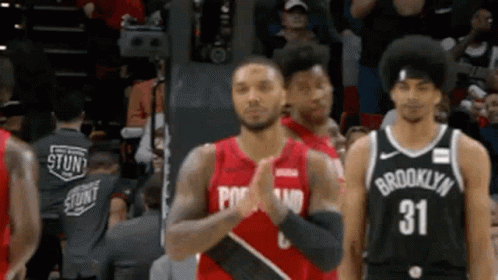 Basketball Players Standing on Court
