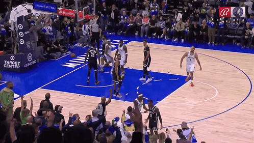 Basketball Players with Target Center Banner