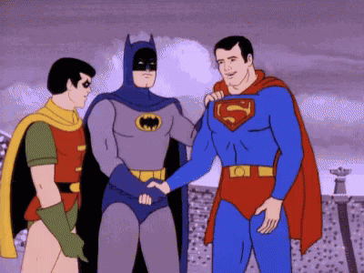 Batman And Superman Are Shaking Hands In A Cartoon GIF