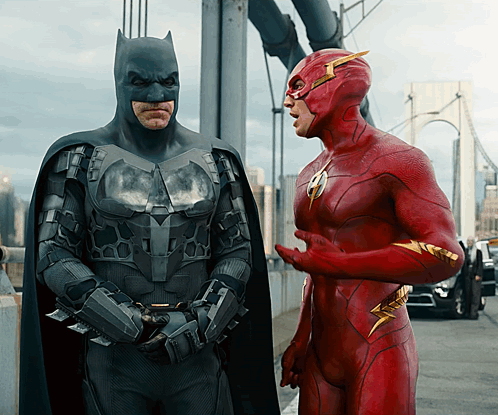 Batman And The Flash Standing Talking GIF