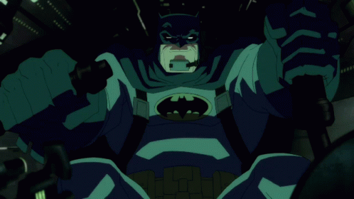 Batman Holding Gun