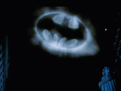 Batman Logo Projected on Dark Background