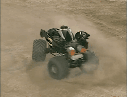 Batman Monster Truck Driving on Dirt Track