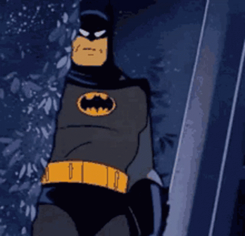 Batman Standing in Front of Building