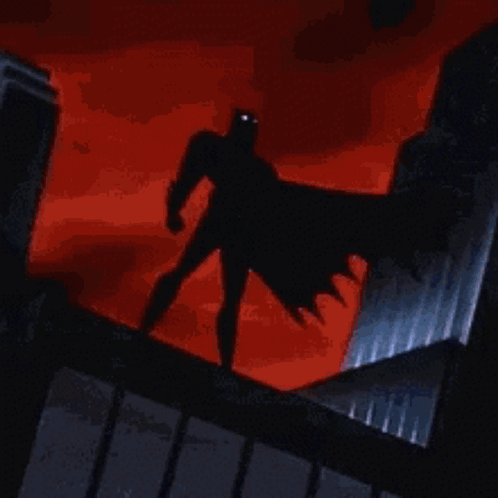 Batman Standing on Building Edge