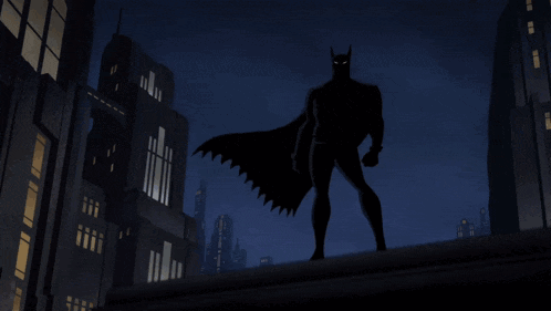 Batman Standing On Rooftop With Lightning GIF