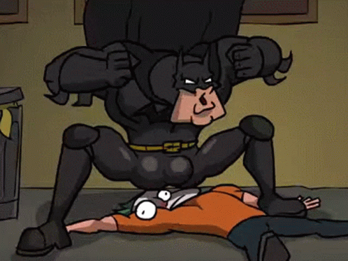 Batman Standing Over Joker GIF