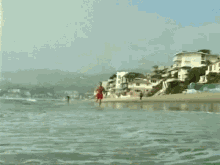 Beach Hunk Running GIF