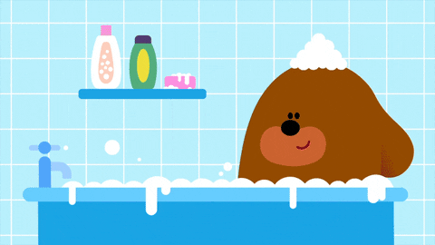 Bear Holding Rubber Duckie Bubble Bath GIF