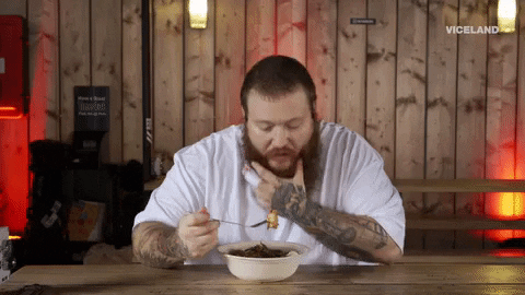 Beard Man Takes A Bite GIF