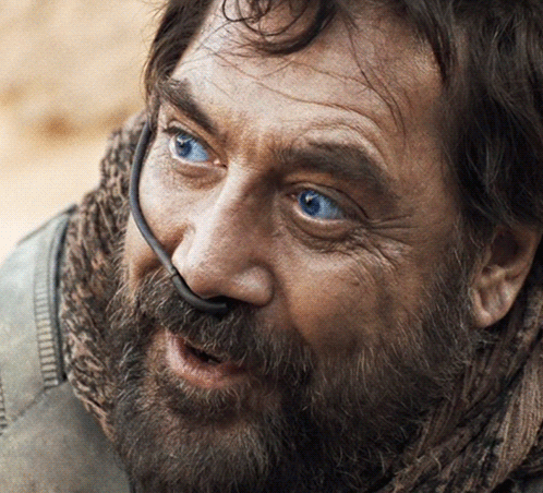 Bearded Blue-Eyed Man With Headset on Nose