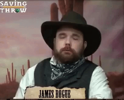 Bearded Cowboy With Vest Holding James Bogue Sign
