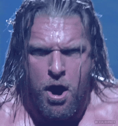 Bearded Long Haired Man Making Funny Face Open Mouth