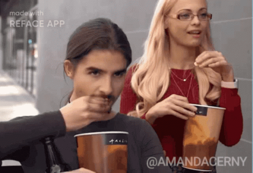 Bearded Man and Glasses Woman Eating Reface Cups