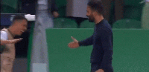 Bearded Man and Soccer Player on Field