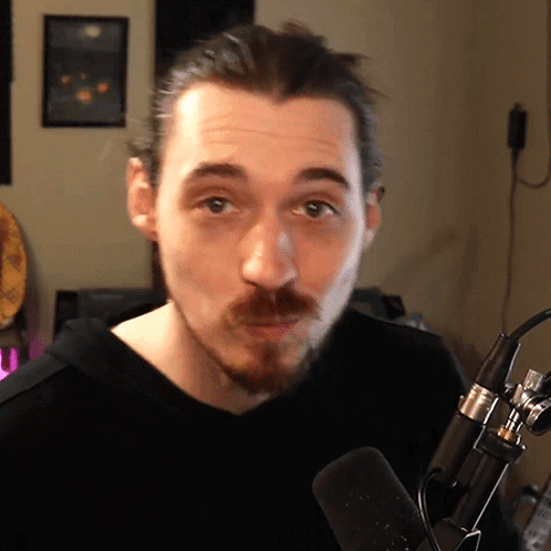 Bearded Man at Microphone
