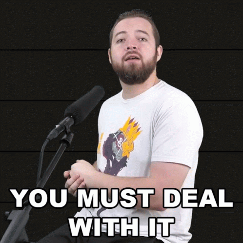 Bearded Man at Microphone Says You Must Deal With It