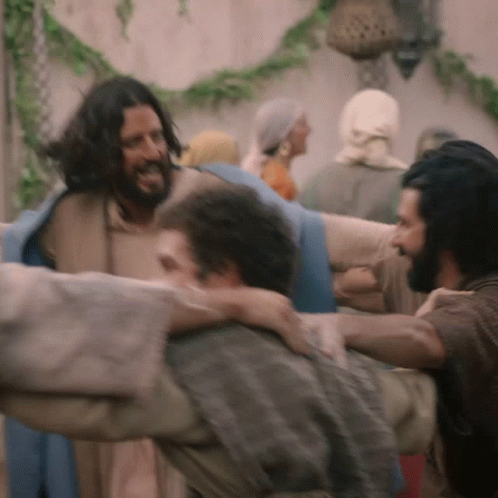Bearded Man Carrying Another Man on Shoulders