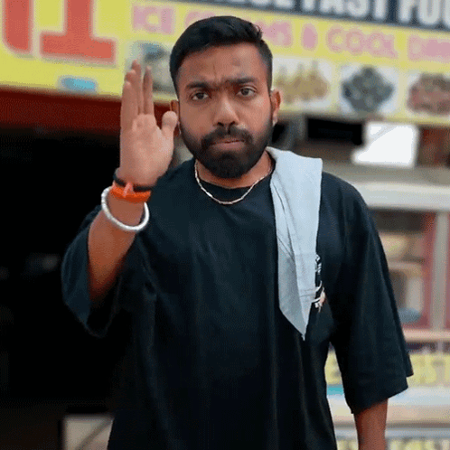 Bearded Man Giving Middle Finger At Ice Cream Sign GIF