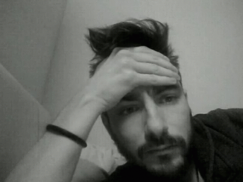 Bearded Man Hand To Forehead Black And White GIF
