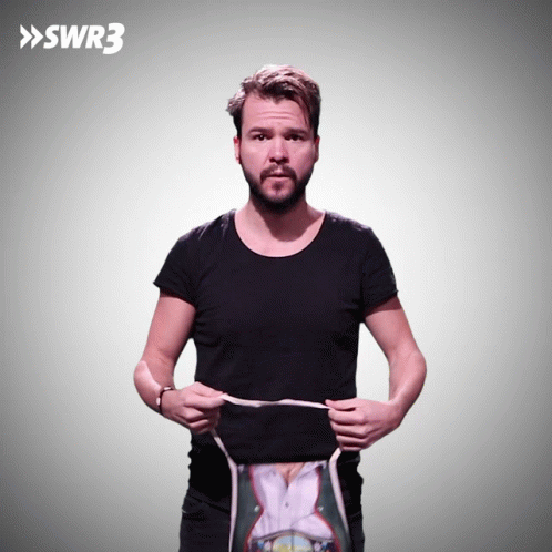 Bearded Man Holding Black Shirt Saying Swr3