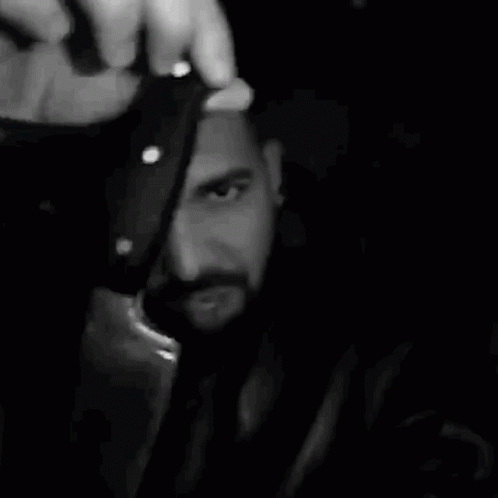 Bearded Man Holding Bottle GIF
