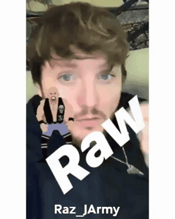 Bearded Man Holding Cartoon Figure Saying Raw GIF