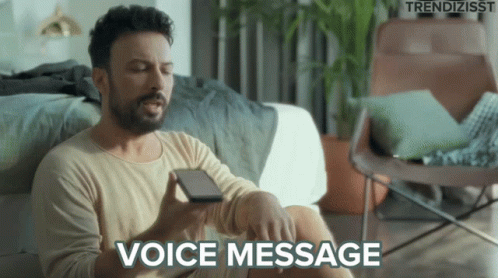 Bearded Man Holding Cell Phone Voice Message