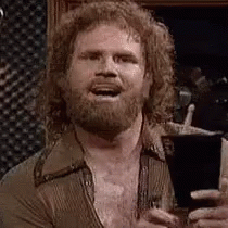 Bearded Man Holding Glass of Beer