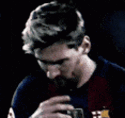 Bearded Man Holding Hand To Mouth In Blue Red Shirt GIF