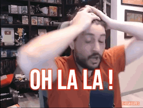 Bearded Man Holding Head Saying Oh La La GIF