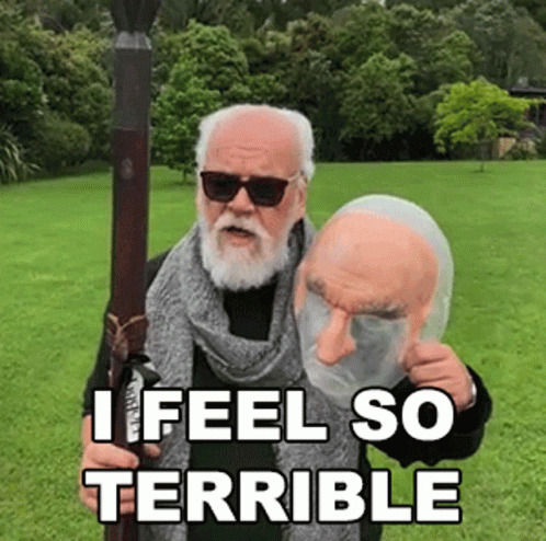 Bearded Man Holding I Feel So Terrible Mask GIF