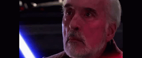 Bearded Man Holding Light Saber