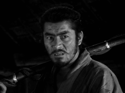 Bearded Man Holding Sword