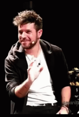 Bearded Man in Black and White Clapping