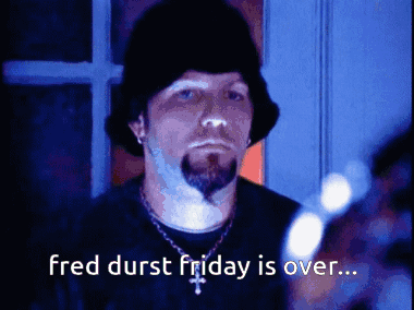 Bearded Man in Black Hat and Necklace Saying Fred Durst Friday Is Over