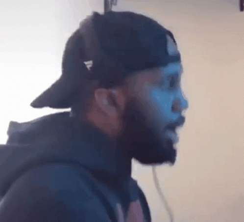 Bearded Man in Black Hat with Adidas
