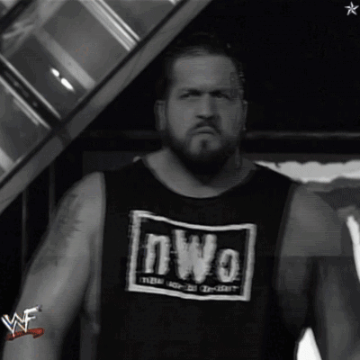 Bearded Man in Black NWO Tank Top