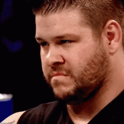 Bearded Man in Black Shirt Making Funny Face