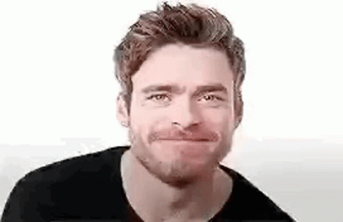 Bearded Man In Black Shirt Making Funny Face GIF