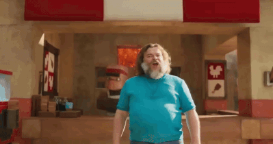 Bearded Man in Blue Shirt at Chicken Restaurant