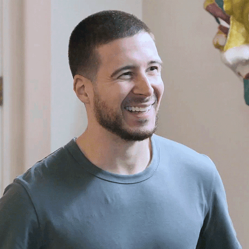 Bearded Man in Blue Shirt Smiling