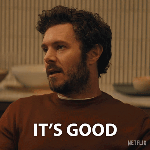 Bearded Man in Brown Sweater Saying It's Good