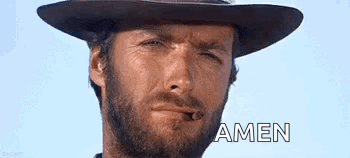 Bearded Man in Cowboy Hat Smoking Cigarette