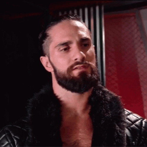 Bearded Man in Fur Coat and Leather Jacket