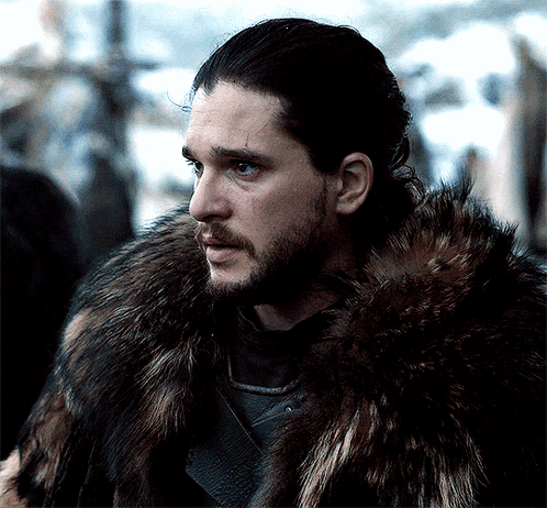 Bearded Man in Fur Coat Looking Sideways