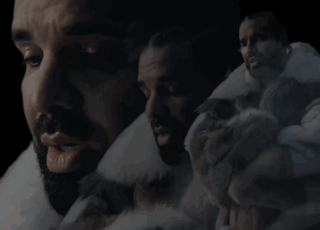 Bearded Man in Fur Coat Surrounded by Men