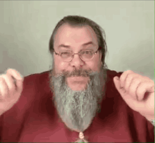 Bearded Man in Glasses and Red Shirt