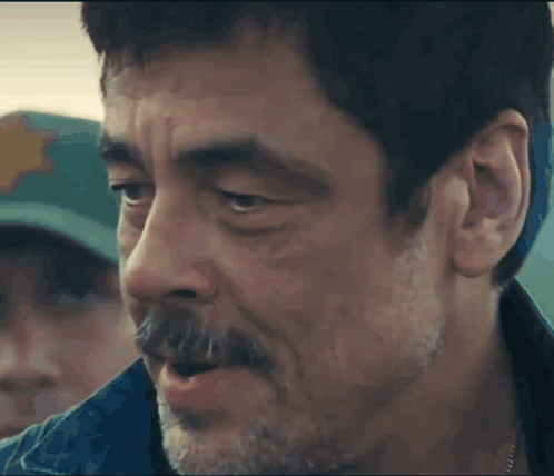 Bearded Man In Green Hat With Star GIF