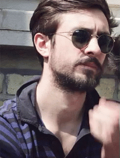Bearded Man In Green Plaid Shirt Saying G.I. Vine GIF